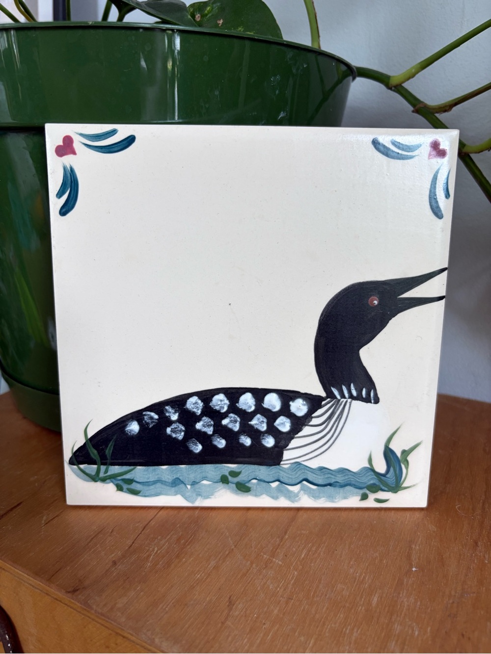 Hand-Painted Black Loon Ceramic Tile Art